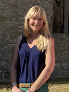 Hannah Vernon 01 Photo of Hannah Vernon in front of St Michael's Church, Croft
