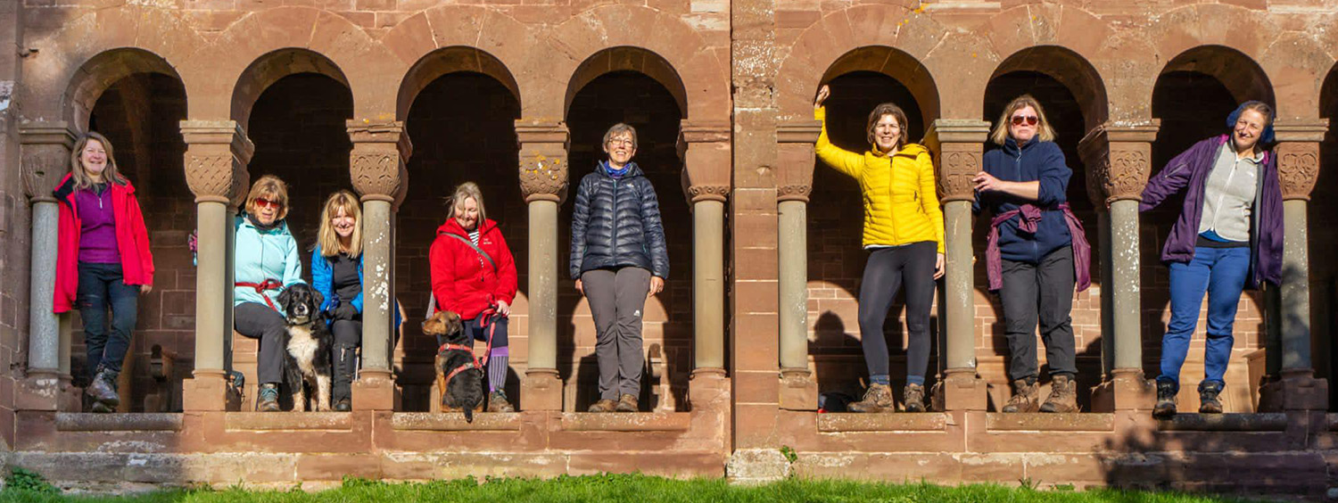 Hannah Vernon Hoarwithy Friends Web Hannah and friends standing in the stone arches at Hoarwithy Church in Herefordshire